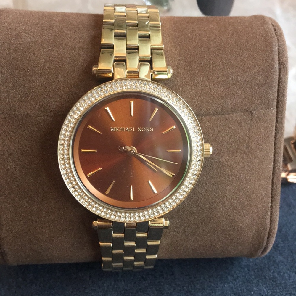 MK WATCH PRICE IS FIRM